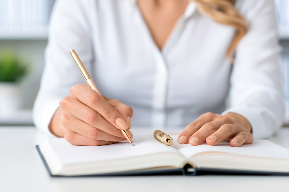 Psychiatrist taking notes during a therapy session